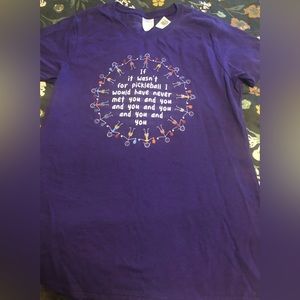 Purple ladies pickle ball T-shirt. New. Short sleeves. 26 inches in length.